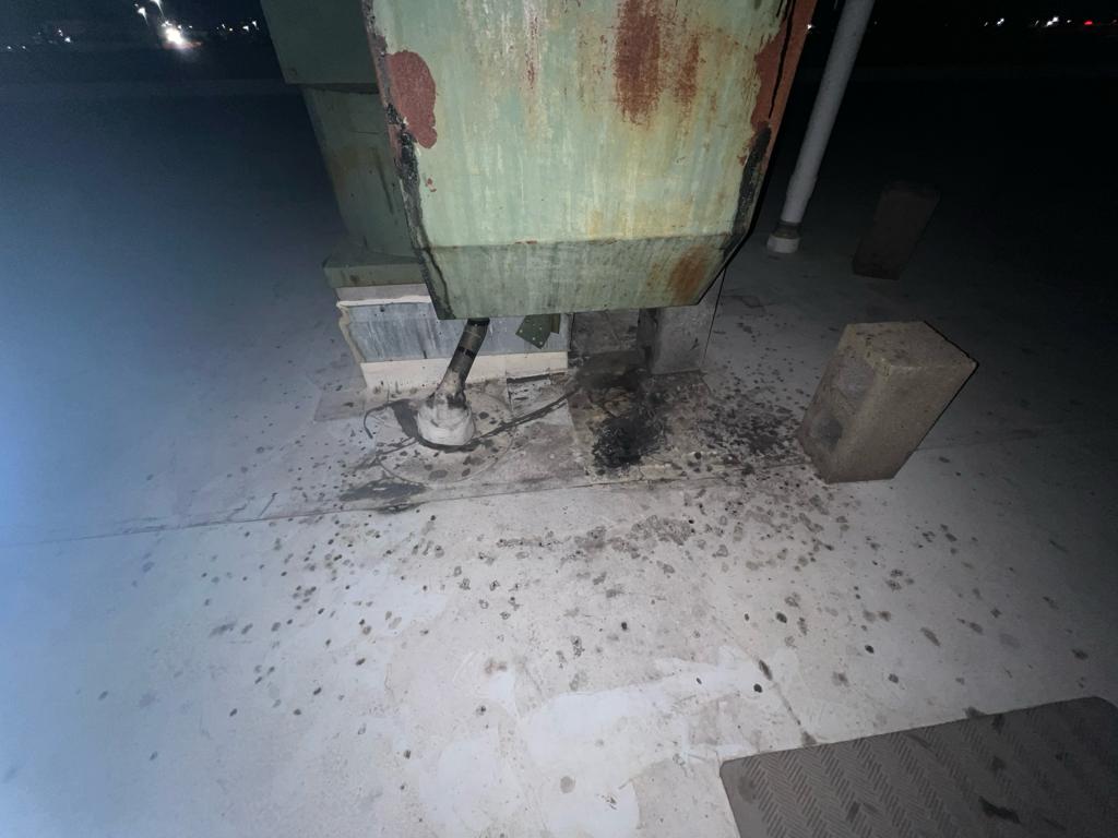 Cornerstone technician scrubbing a kitchen exhaust hood