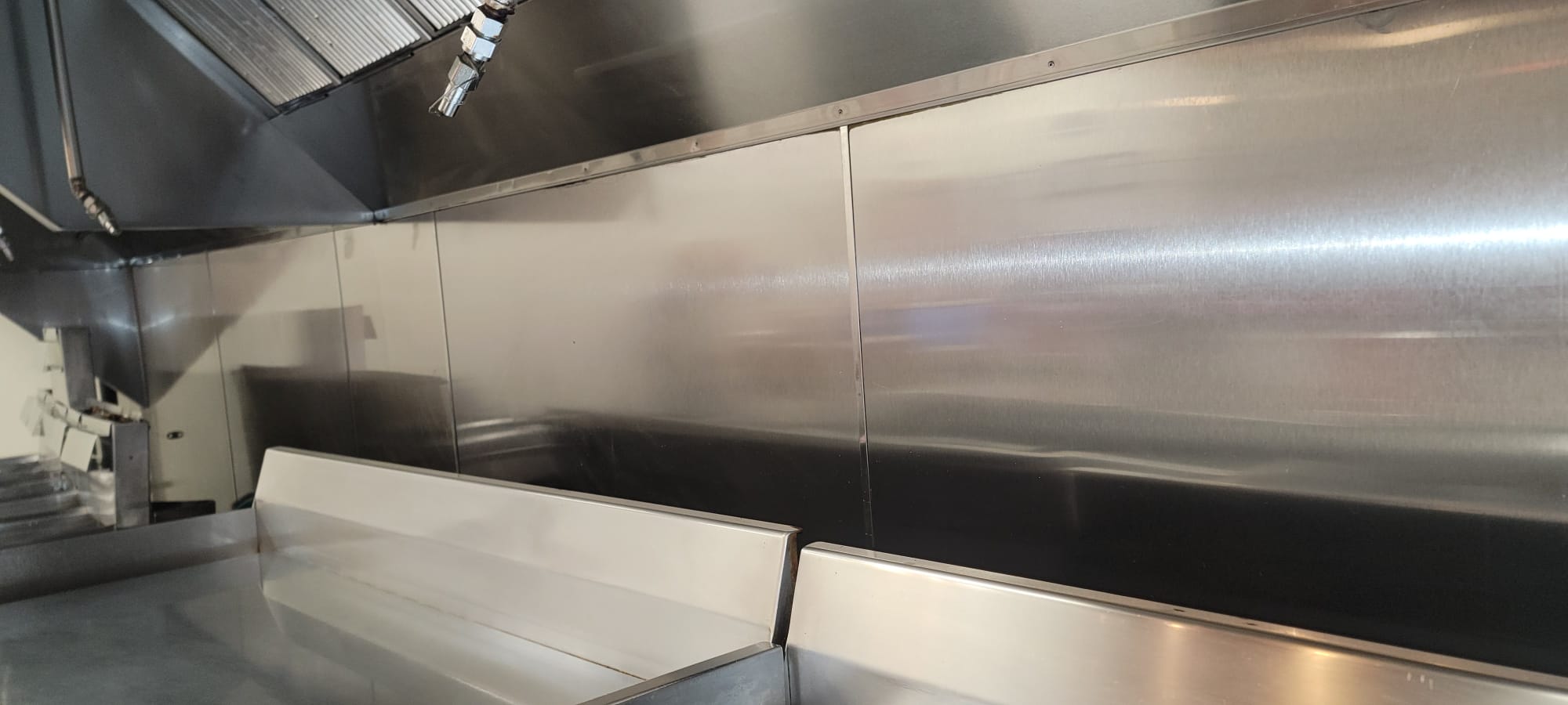 Polished stainless steel kitchen exhaust ductwork