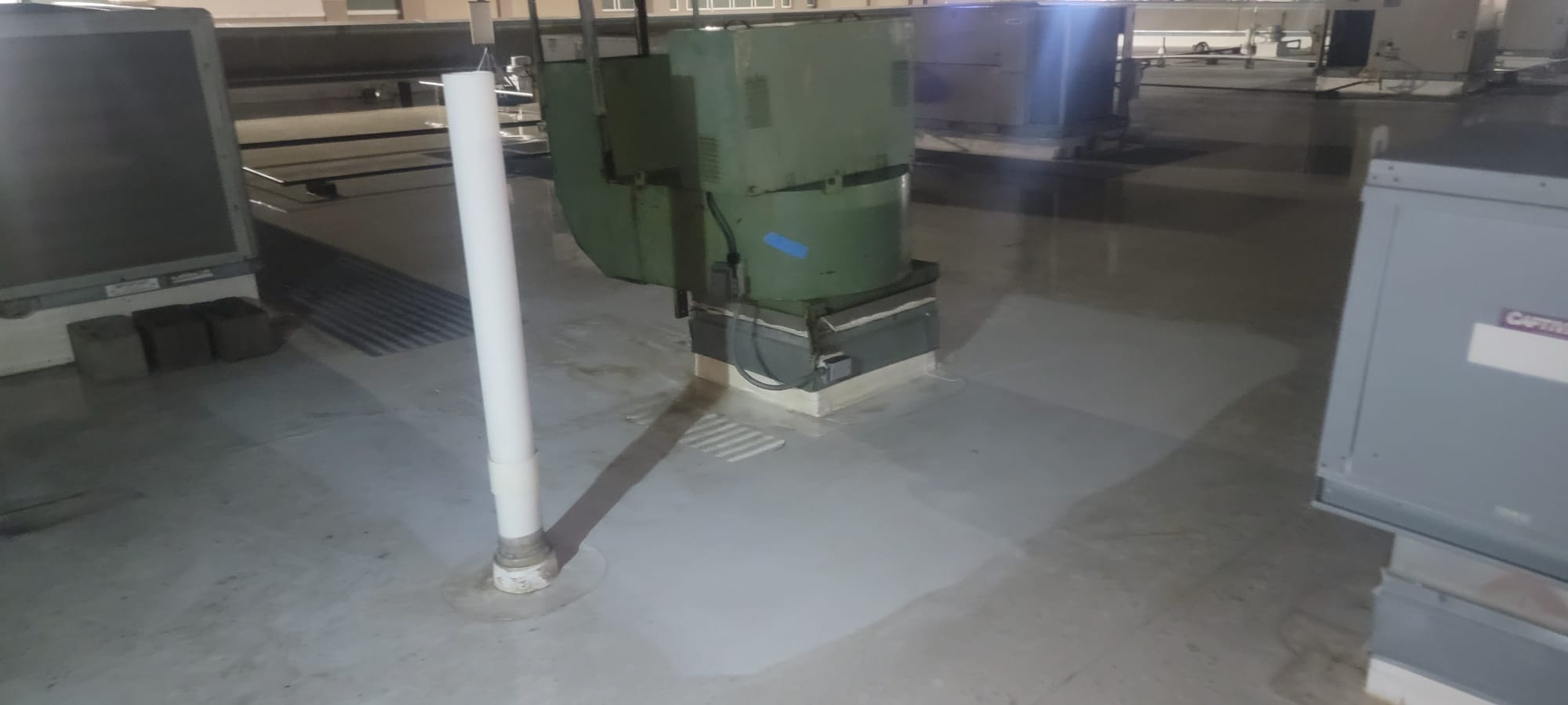 Stainless steel hood over a commercial kitchen cook line