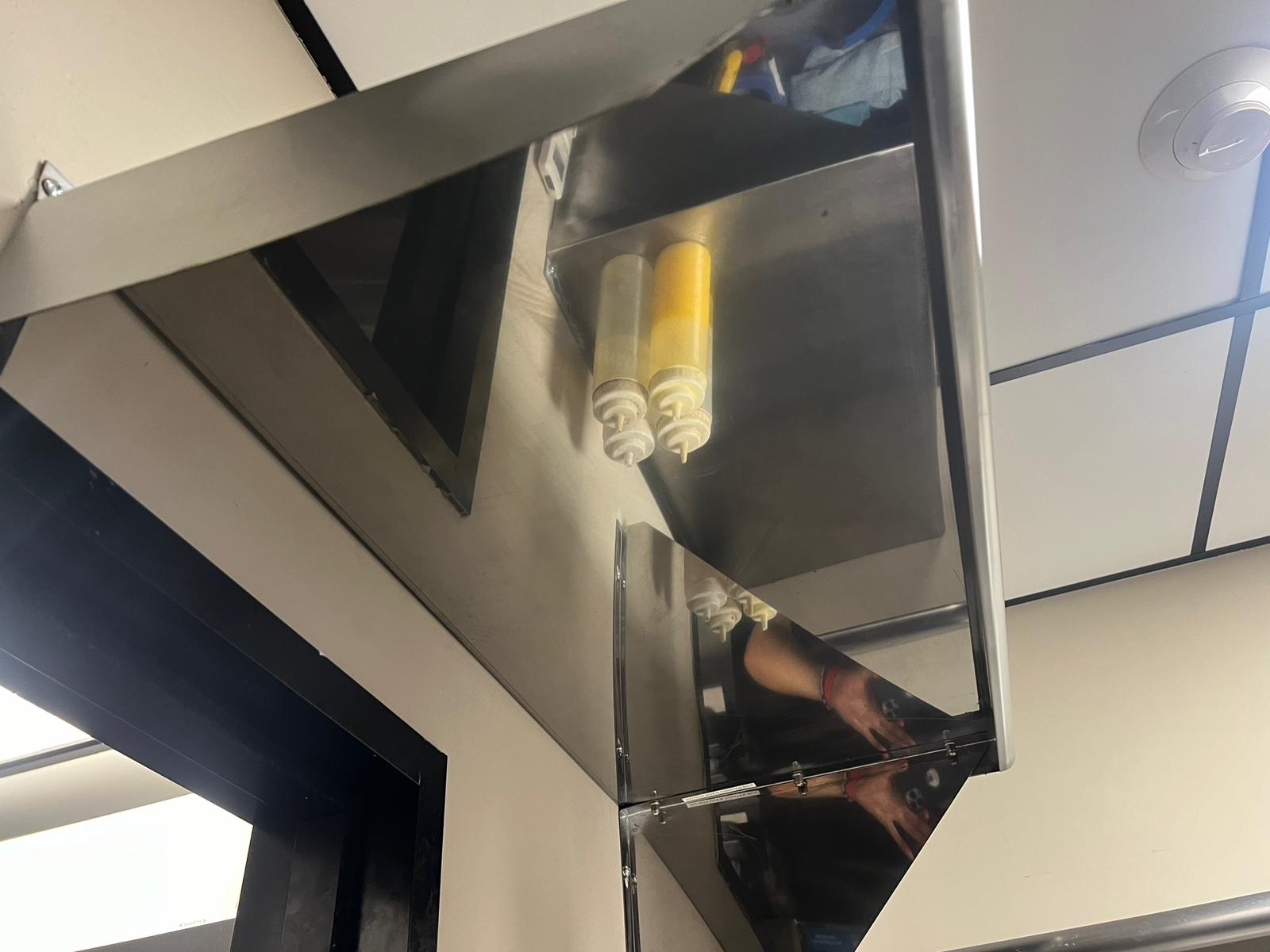 Ventilation hoods above a large institutional kitchen